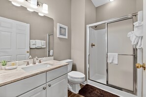 Shower, hair dryer, towels