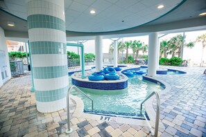 A heated pool - Newly Renovated Oceanfront Luxury Condo: Steps to Sand & Oceanfront Views (Myrtle Beach)