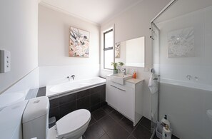 Shower, hair dryer, towels, soap