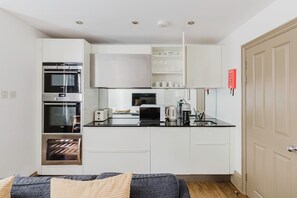 Fridge, microwave, oven, dishwasher - Upscale Fitzrovia 1BR, Fully Equipped + Kitchen, by Blueground (London)