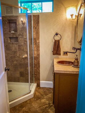 Shower, hair dryer, towels, soap