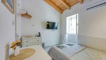 1 chambre, fer et planche à repasser, Wi-Fi gratuit, draps fournis