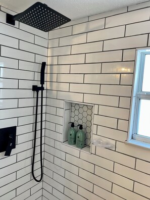 Shower, hair dryer, towels, soap