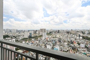 A cityscape with high-rise buildings and a dense urban layout. - Urban Zen Saigon - SOHO Residence D1 (Ho Chi Minh City)
