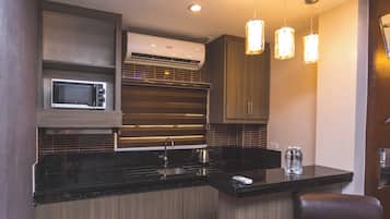 Luxury Suite, Balcony | Private kitchen | Mini-fridge