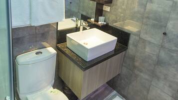 Luxury Suite, Balcony | Bathroom | Shower, hair dryer, towels, soap