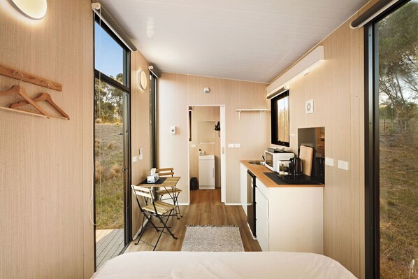 1 bedroom, bed sheets - Rowsley Valley Tiny House 1 by Tiny Away (Glenmore)