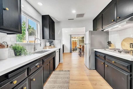 Fridge, microwave, oven, stovetop. Main Street Retreat in Roseville