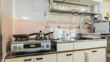 Fridge, microwave, stovetop, cookware/dishes/utensils