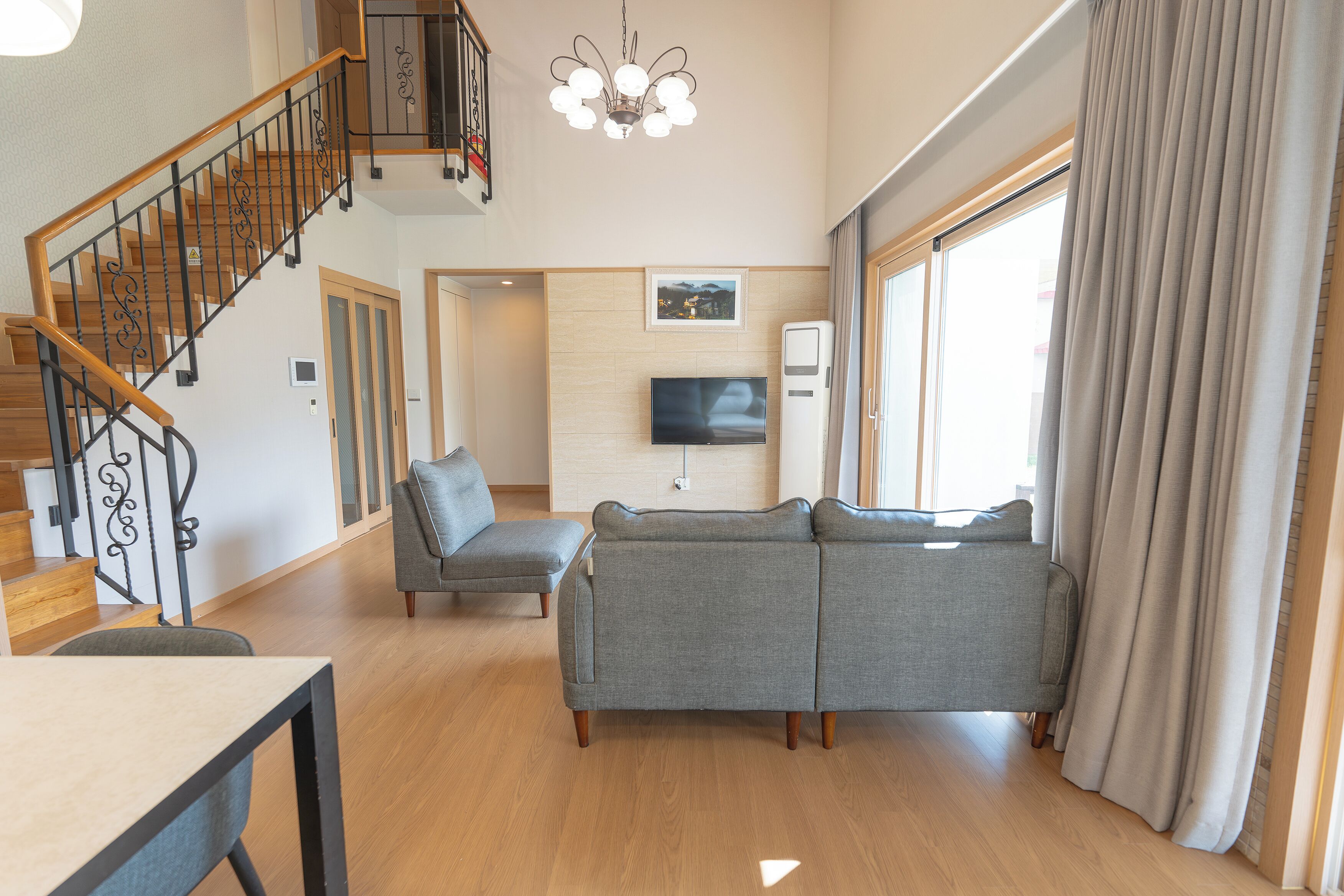 Jacuzzi House | Living area | 66-inch LED TV with cable channels, Netflix, first-run films
