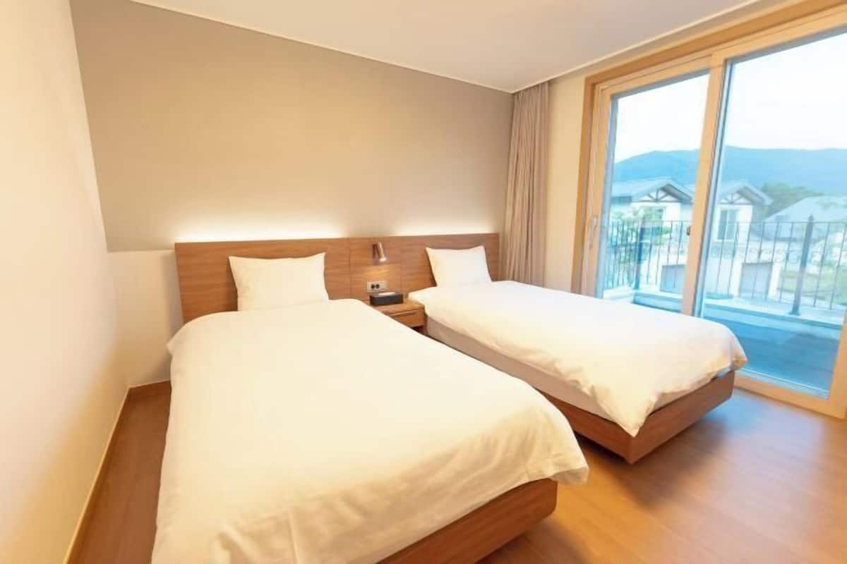 Premium bedding, memory foam beds, blackout drapes, soundproofing
