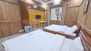 Twin Room, 2 Queen Beds, Garden View | Desk, laptop workspace, free WiFi