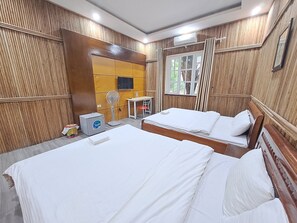 Twin Room, 2 Queen Beds, Garden View | 1 bedroom, desk, laptop workspace, free WiFi
