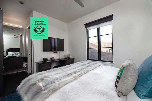 1 bedroom, desk, iron/ironing board, travel crib