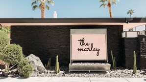 A building facade with a sign that reads "the marley".