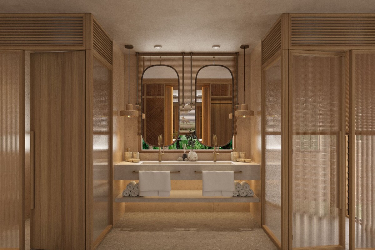 Une salle de bain moderne avec un double vasque, de grands miroirs et un lambris en bois.