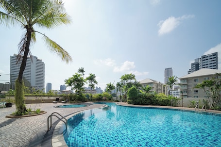 Outdoor pool, pool umbrellas, sun loungers