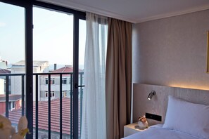 Hypo-allergenic bedding, down duvets, minibar, in-room safe