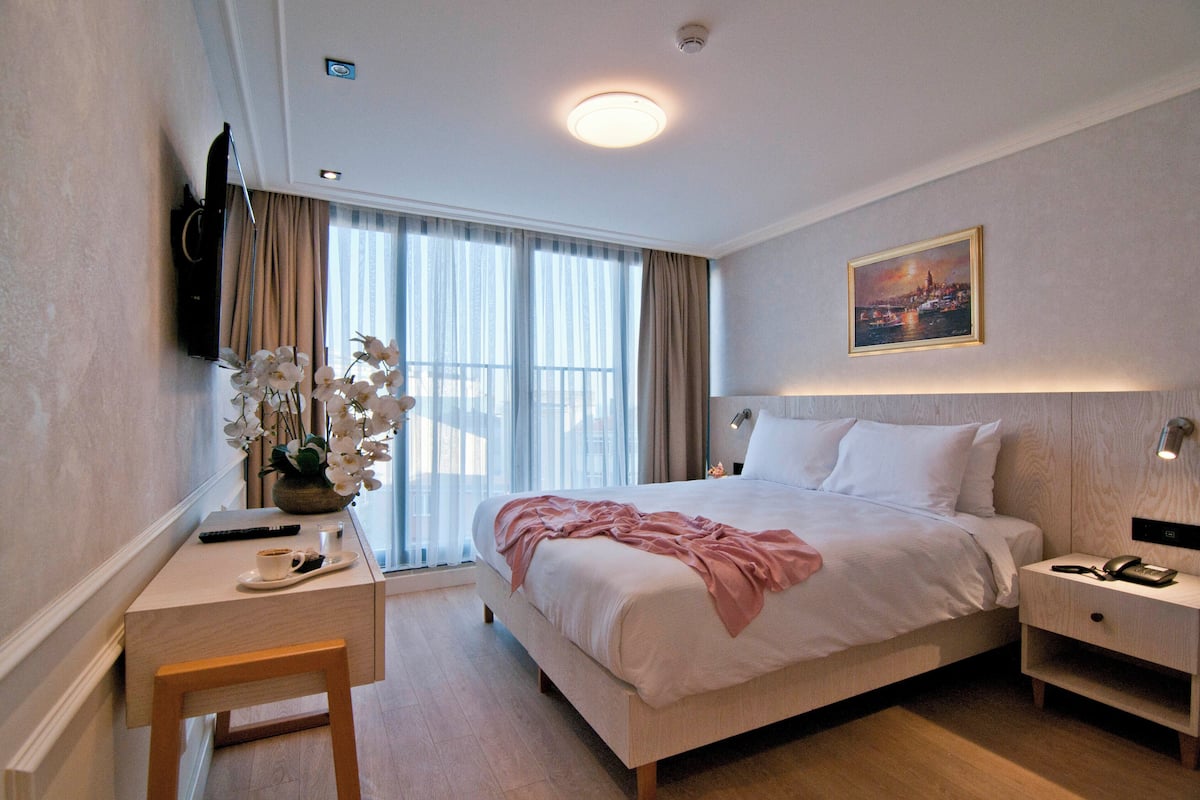 Hypo-allergenic bedding available, down comforters, minibar