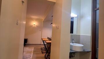 Family Apartment, Balcony, City View | Bathroom | Shower, free toiletries, slippers, towels