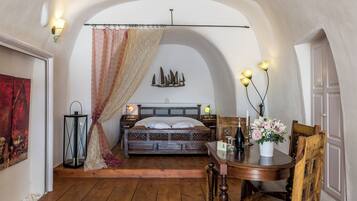 1 habitación, tabla de planchar con plancha y cuna de viaje