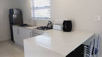 Fridge, microwave, stovetop, electric kettle