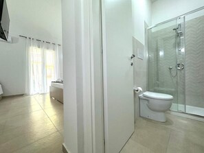 Shower, hair dryer, towels, soap