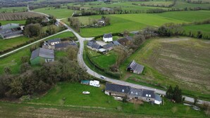 An aerial view of a rural area with houses, roads, and fields. - L Abreuvoir DU Leffo Entre MER ET Campagne. Ressourcez Vous Avec vos Animaux (Allineuc)