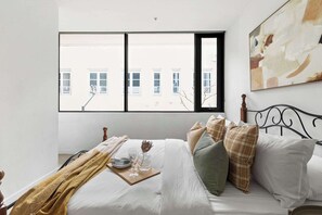 2 dormitorios, tabla de planchar con plancha, wifi y ropa de cama