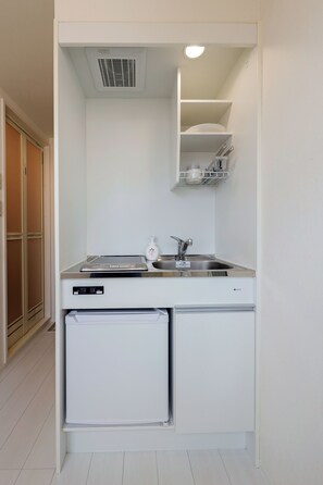 Mini-fridge, microwave, stovetop, electric kettle