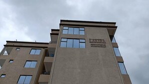 A multi-story building with the name "LAKIRA SHADES" on the facade. - Lux Suites Lakira Shades Ongata Rongai (Ongata Rongai)