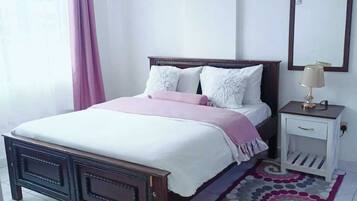 Family Apartment, Balcony, City View | Individually decorated, individually furnished, laptop workspace