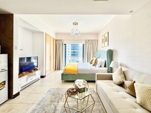 Deluxe Studio, Lake View | In-room safe, blackout drapes, iron/ironing board, free WiFi