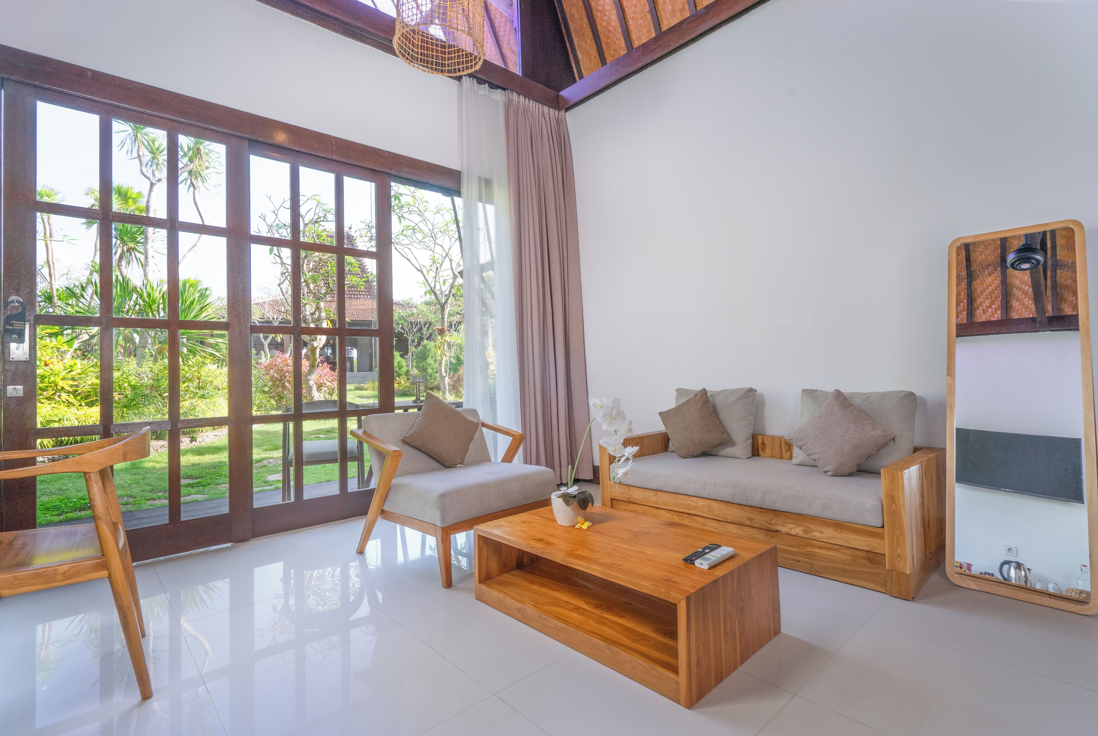 Deluxe Cottage, Patio, Garden View | Minibar, in-room safe, desk, laptop workspace