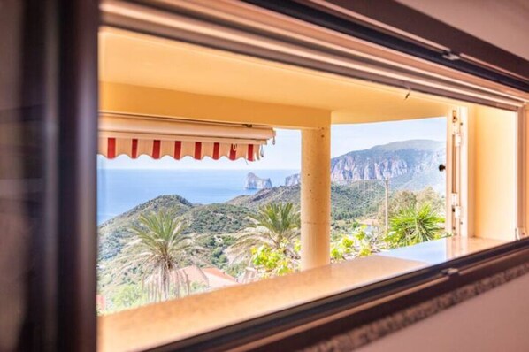 Departamento, vista al mar | 2 habitaciones, cortinas blackout y tabla de planchar con plancha