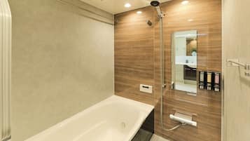 Combined shower/tub, hair dryer, slippers, bidet