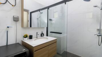 Shower, towels, soap, toilet paper