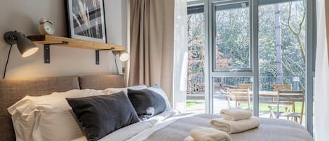 Appartement, 2 slaapkamers | 3 slaapkamers, een strijkplank/strijkijzer, beddengoed