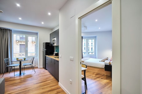 Superior Apartment, City View | Living area | 32-inch Smart TV with digital channels