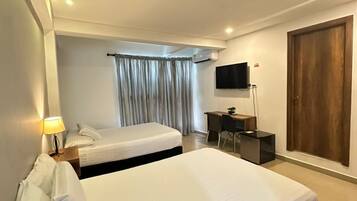 Standard Quadruple Room, 2 Double Beds | In-room safe, free WiFi