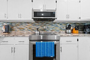 Fridge, microwave, oven, stovetop - Good Times & Tan Lines / 1634 E Beach Drive (Oak Island)