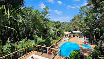 Outdoor pool, open 9:00 AM to 10:00 PM, pool umbrellas, sun loungers
