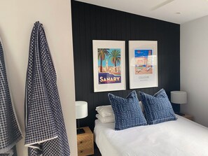 2 bedrooms, desk, iron/ironing board, travel crib