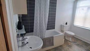 Hair dryer, towels, soap, shampoo