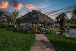 Terrace/patio - Relax in Style: 3BR/2BA Retreat, Pool & Tiki Hut (Cape Coral)