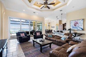 TV, fireplace, offices - Peace River Waterfront Luxury Living - 5-BD w Pool (Port Charlotte)