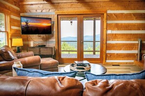 TV, fireplace - *Amazing 3BD Lodge w/ HOT TUB! Fire Pit + Arcades* (Sevierville)