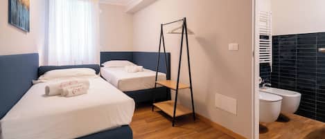 2 bedrooms, blackout curtains, iron/ironing board, free WiFi