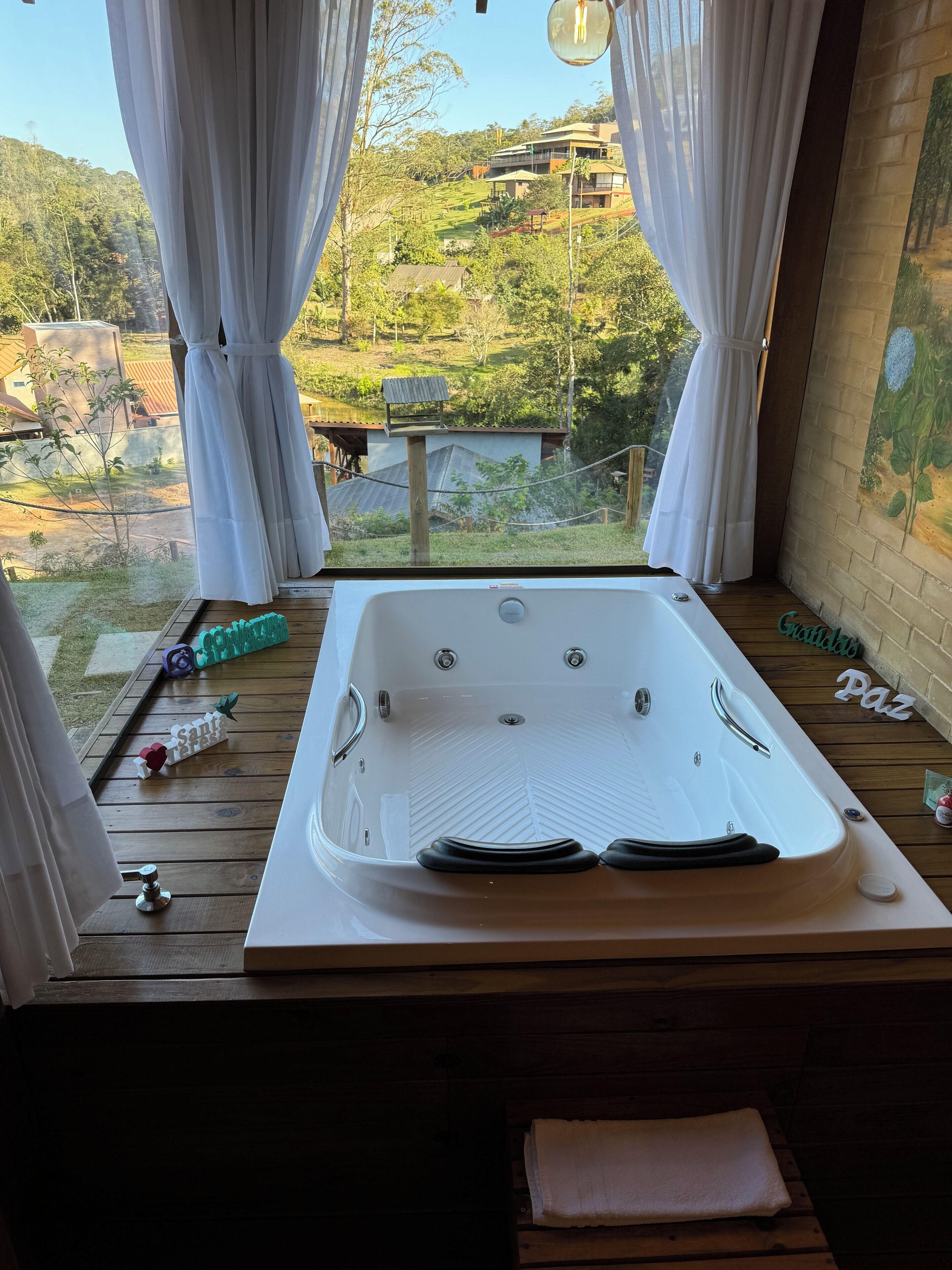 Separate tub and shower, hair dryer, bathrobes, towels