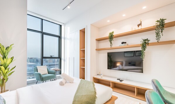 In-room safe, iron/ironing board, free WiFi, bed sheets - Stylish Studio Apartment in Blue Wave Tower, Dubailand by Deluxe Holiday Homes (Dubai)